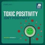 Season 8 Episode 4: There is a great opportunity to better understand the term “Toxic Positivity” and to more accurately identify the traits of toxic leaders and the true characteristics of authentic, positive leaders. Shows image of a magnifying glass with a large green smile surrounded by bunches of small red frowning faces.