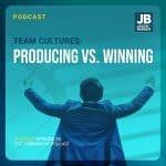 Team Cultures: Producing vs. Winning - man with fists in air