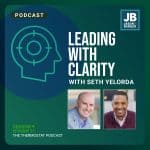 Season 9 Episode 21: Leading with Clarity with Seth Yelorda. Image of Jason and Seth with a crash test dummy head icon in blue.