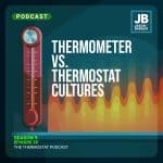 Season 9 Episode 35: Thermometer Vs Thermostat Cultures. Image of a thermometer and the temperature with fire around it rising, it is hot!